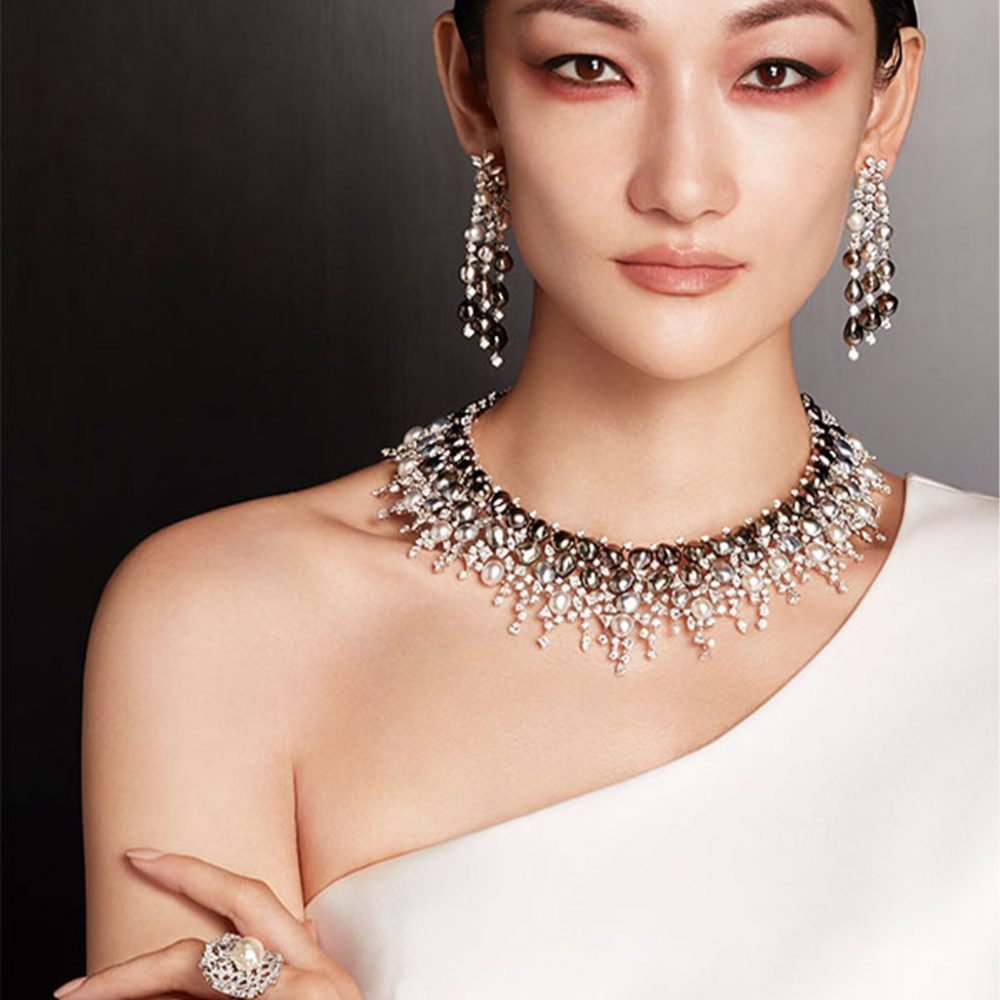 Japanese actress wearing diamond earrings, necklace and pearl ring