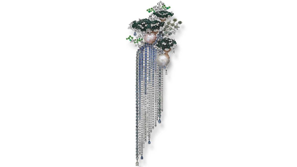 Brooch in 18k white and rose gold with freshwater pearl, jadeite, tanzanite, emeralds, sapphires, and diamonds, price on request