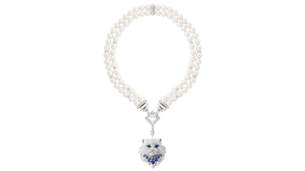 White pearls collar with cat head pendant with white and blue diamonds