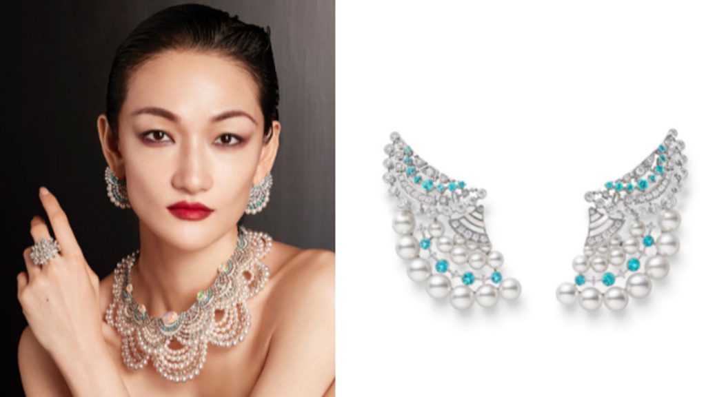 Tominaga wears jewels in 18k white gold with akoya pearls, opals, tourmalines, diamonds, and mother-of-pearl.